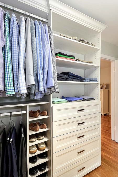 Walk-in closet organization system with shoe cubbies custom shelves and drawers